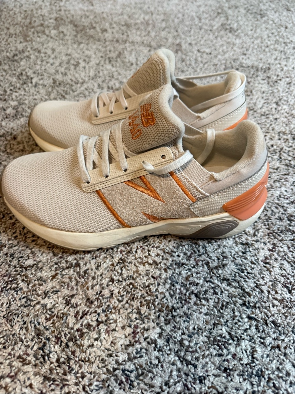 New Balance Women's Cream Sneakers with Orange Logo Accents